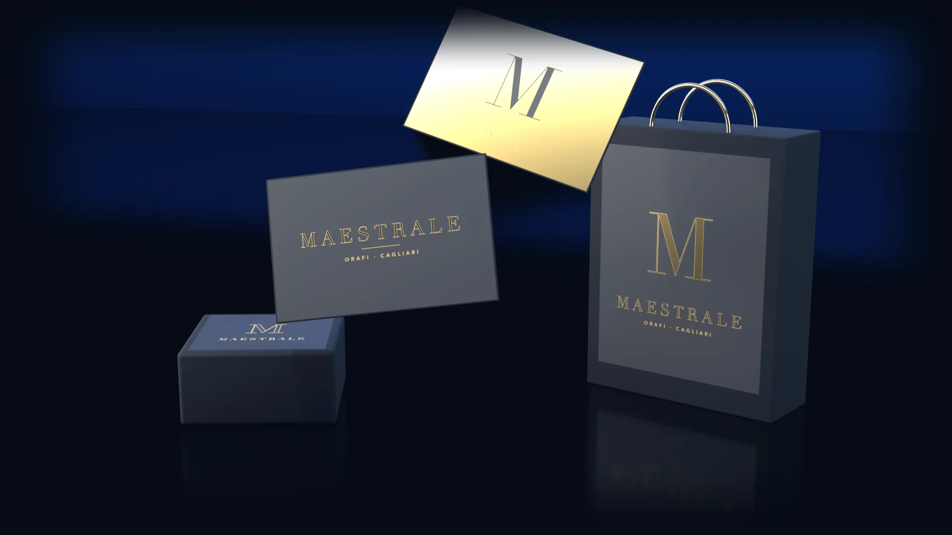 Biglietti da visita, una scatola portagioie e una shopper neri con il marchio in lamina d'oro